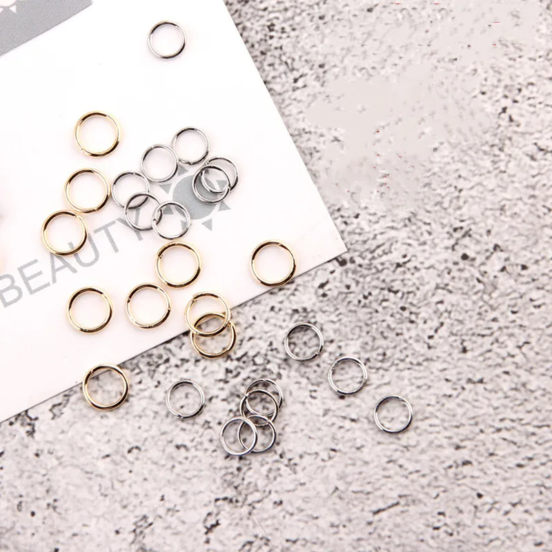 Позолоченное кольцо 18 карат с белым соединительным кольцом и открытыми кольцами