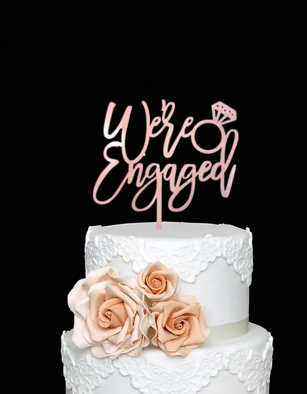 

Mirror Rose Gold We're Engaged Cake Topper - Engagement Cake Topper - Wedding/Bridal Shower/Engagement Party Decorations