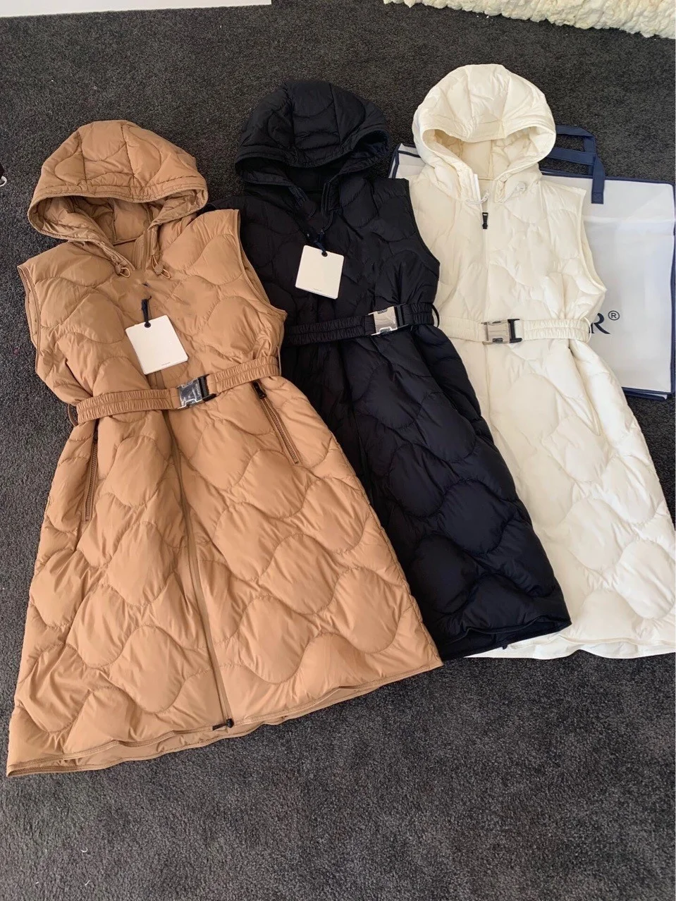 

Fashion high-end Shenzhen Nanyou boutique women's dress with thin waist, hooded medium and long down jacket women's fashion