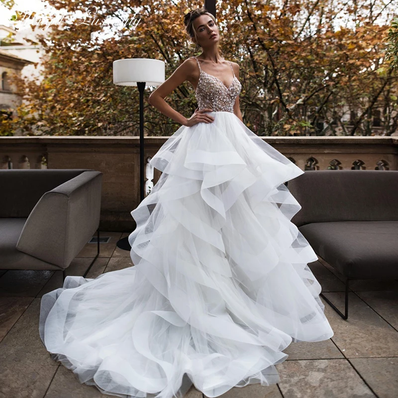 

Luxury A-line Wedding Dresses Spaghetti Straps V-neck Backless Glamorous Gowns Diamond Bead Delicate Layered Tulle Ruffle