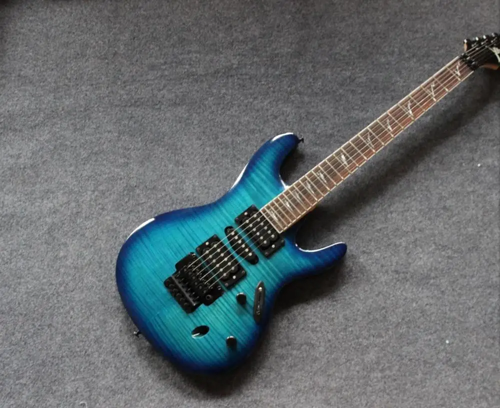 

Custom shop.blue color tiger flame top electric guitar.high quality pickups.handmade 6 stings rosewood fingerboard guitarra.