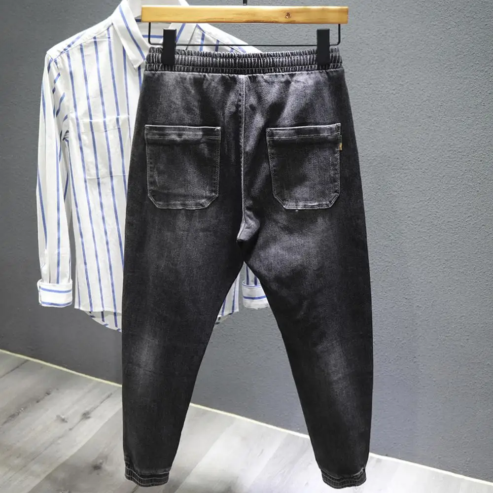 2022 Versatile fashion ripped pants slim stretch pants young jeans man