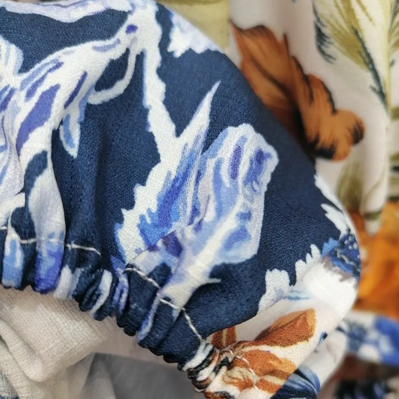 

Australia fashion holiday style sexy open back cross skirt V-neck back personalized strapless waist printed short dress