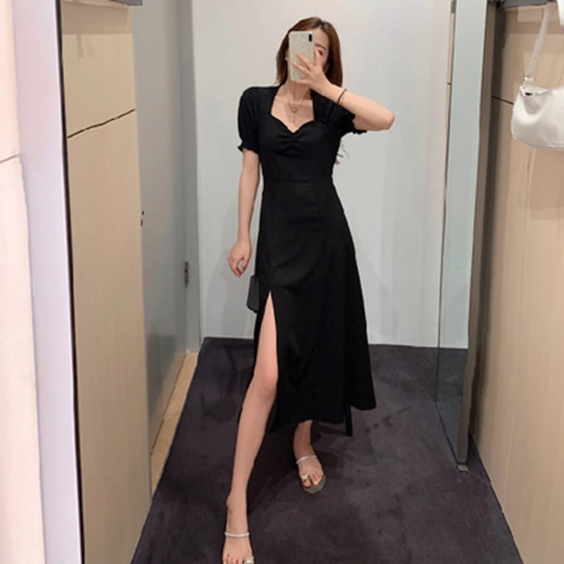 

2021 large size slimming dress new temperament waist tight solid color V-neck bubble sleeve slit French skirt