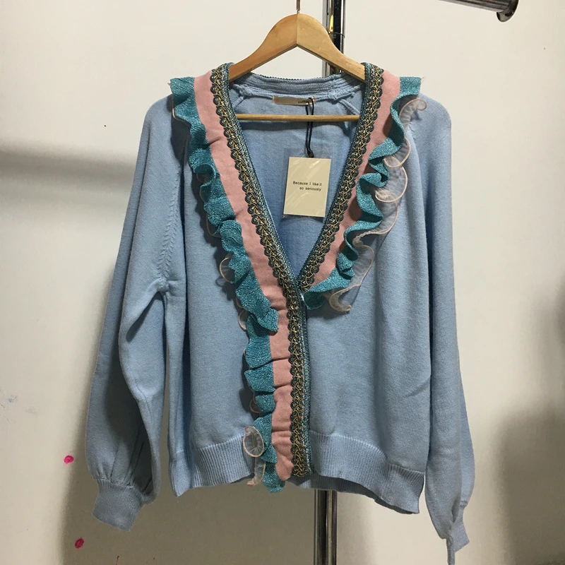 

Korean version of the wild fungus against the color lace stitching knitted cardigan 19 winter new small fresh lazy windy sweater