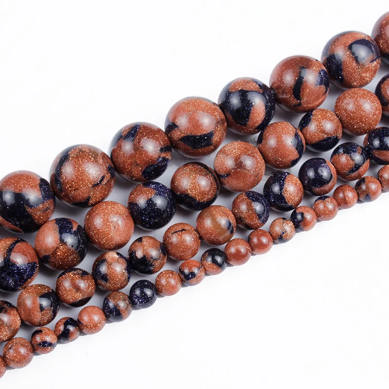 Бусины из натурального камня красные темно-синие мелкого песка для