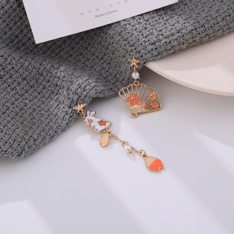 

Original Design Japanese Korean Cute Animal Rabbit Hollow Fan Charm Asymmetrical Tassel Long Drop Earrings for Women Girl