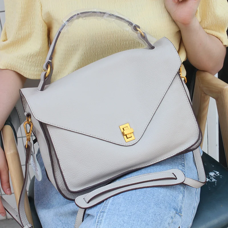 

Soft cow leather simple postman's bag