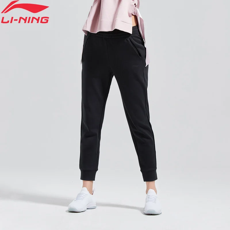 (Клиренс) Li-Ning женские тренировочные спортивные штаны обычные теплые с