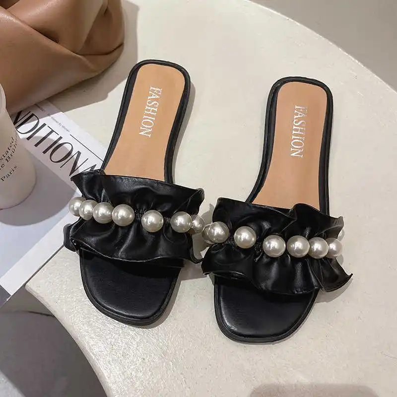 

Summer slippers women's 2021 new Korean flat bottom comfortable versatile soft bottom lace pearl small fresh seaside Sandal