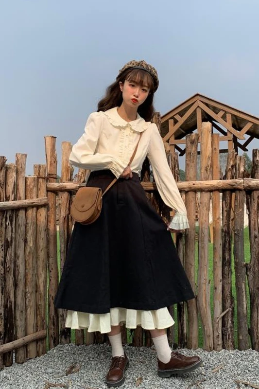 

2020 Japan autumn and winter new women's skirt dark stitching mid-length waist