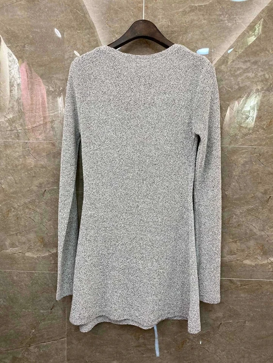 

2021 spring and summer new women's V-neckline chain tassel splicing long sleeve slim knit 324