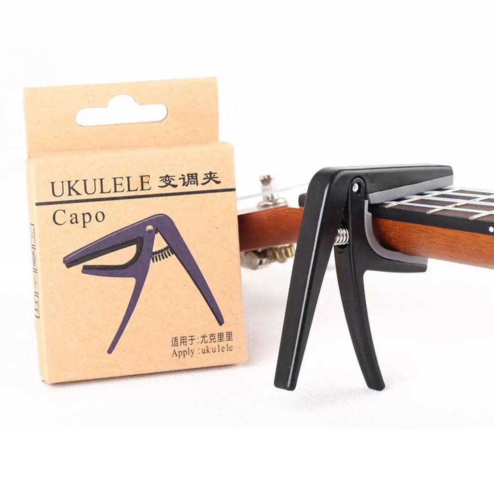 

Professional Ukulele Capo 4 Strings Hawaii Guitar Capos Single-handed Quick Change Ukelele Capo Guitar Parts & Accessories