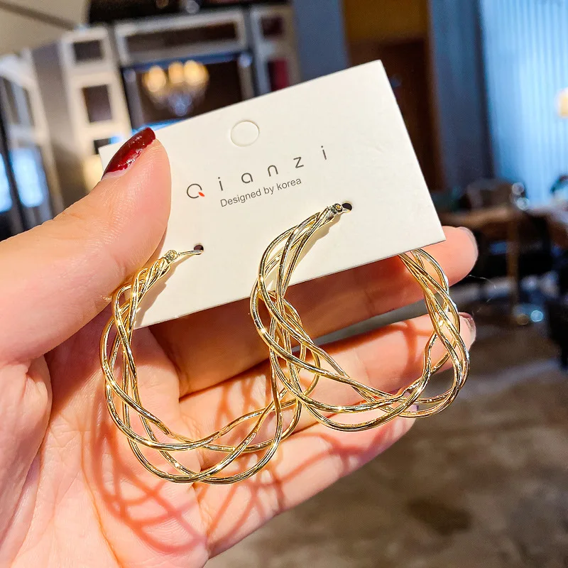

European And American Fashion Exaggeration Net Red Personality Weaving Twist Irregular Twisted Face Ear Ring Female