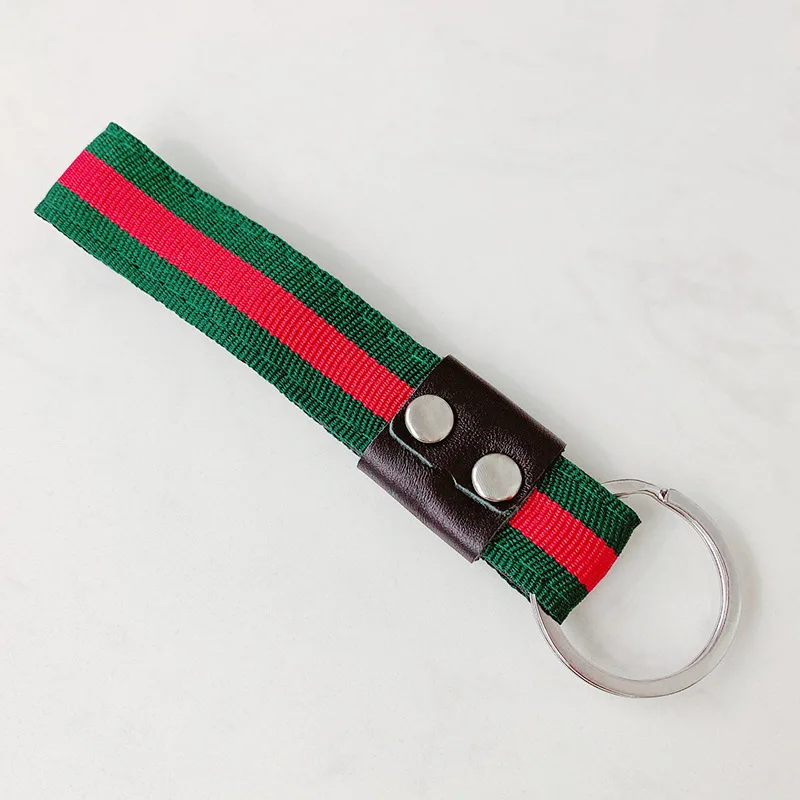 

New Metal Leather Striped Braided Belt Hand Rope Keychain Fashion Bag Pendant Men And Women Car Key Ring Chain Wrist Strap