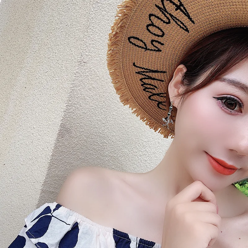 Европейские и американские хип-хоп панк Асимметричные сережки-крестики девушка