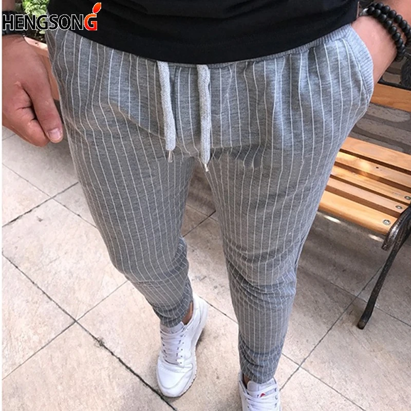 

Men Vertical Stripe Pant Elastic Waist Pocket OL Style Work Trouser 2020 Spring Autumn String Waist Long Pencil Pant Plus Size