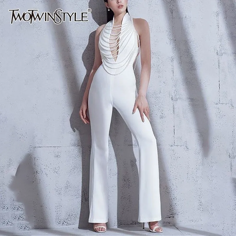 Женский комбинезон TWOTWINSTYLE весенний облегающий с глубоким вырезом и высокой