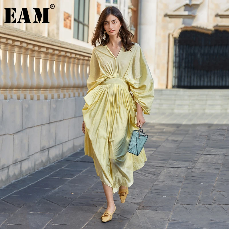 

Multiflora[EAM] Women Backless Pleated Yellow Long Dress New V-Neck Three-quarter Sleeve Loose Fit Fashion Tide Spring Summer 20