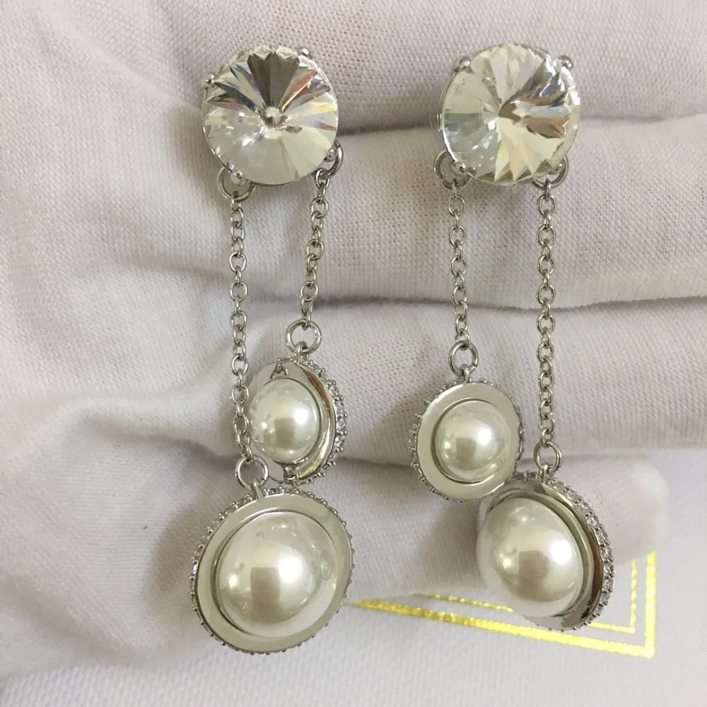 

Pendant Planet Tassel Light Luxury Stud Earrings