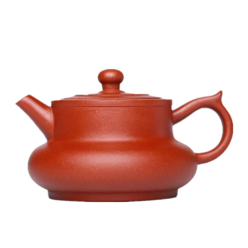 

Yixing purple clay teapot with clear cement and ball hole