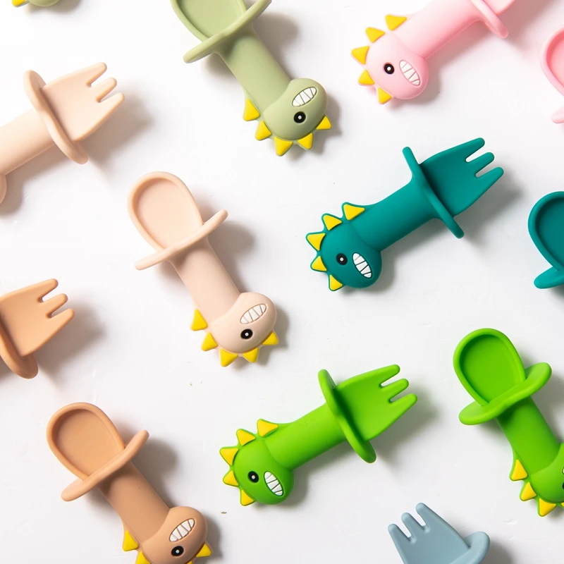 

2pcs/set Baby Learning Spoon Fork Set Silicone Dinosaur Shape Short Handle Easy Spoon Fork Silicone Tableware Children's Goods