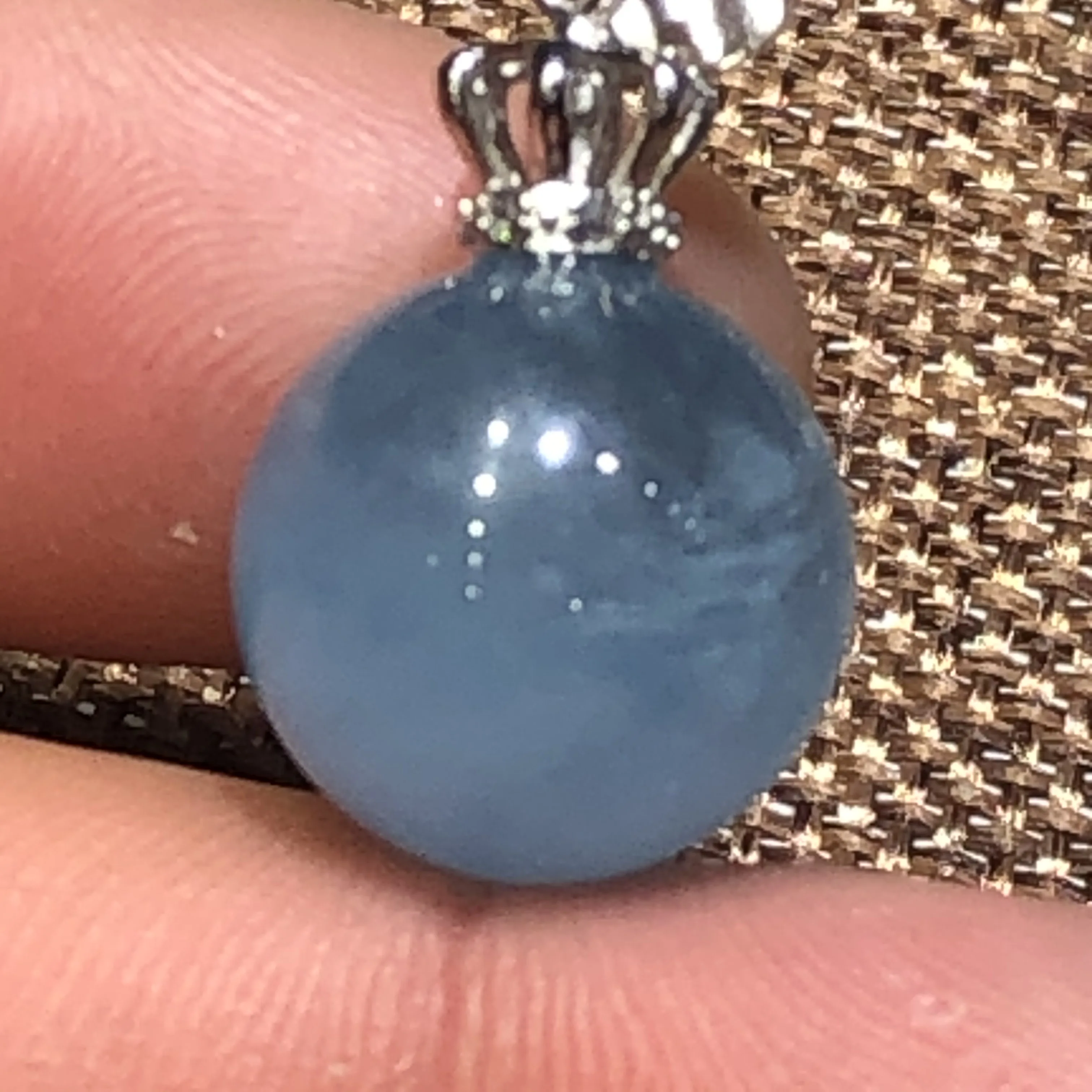 

Natural aquamarine pendants are made to absorb reiki and heal