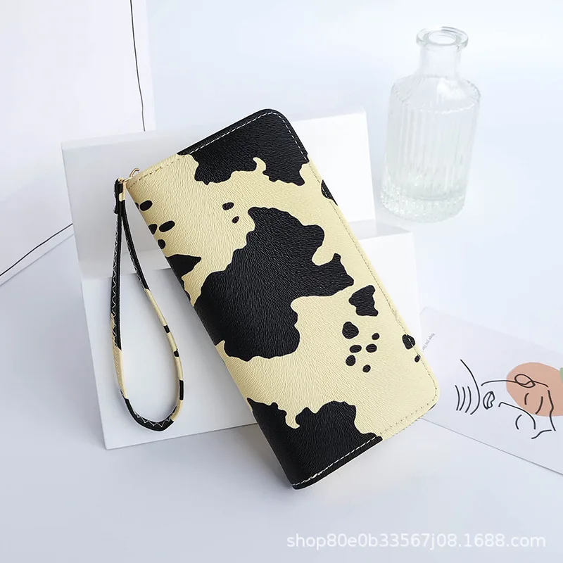 

Cow pattern clutch new women bags 2021 three fold bag wholesale Korean version of the clutch wallet women
