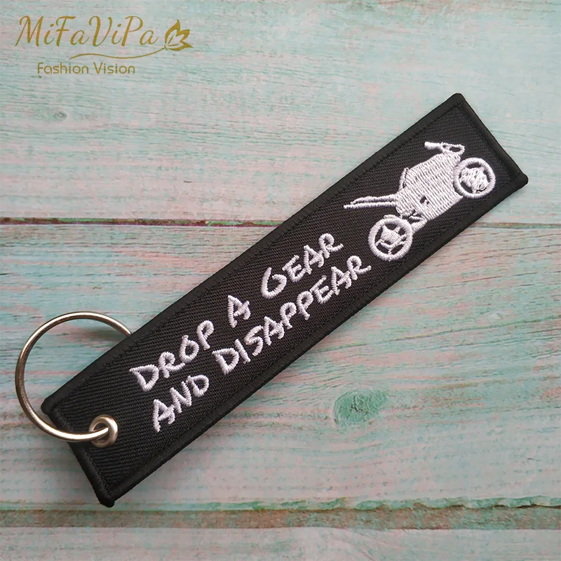 

Drop Shipping Fashion Trinket Customized Keychains for Motorcycle Embroidery DROP A GEAR llavero Gifts Trinket