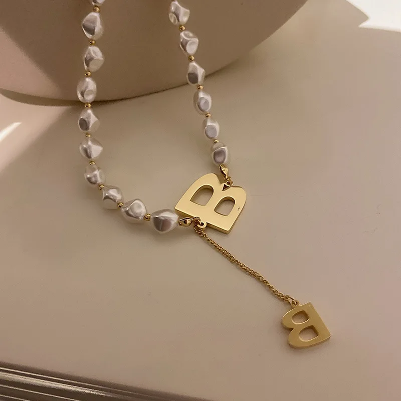 

Vintage White Imitation Pearl Choker Necklace For Women Korean Fashion Cute Bowknot Pendant Necklace Wedding Jewelry Girl Gift