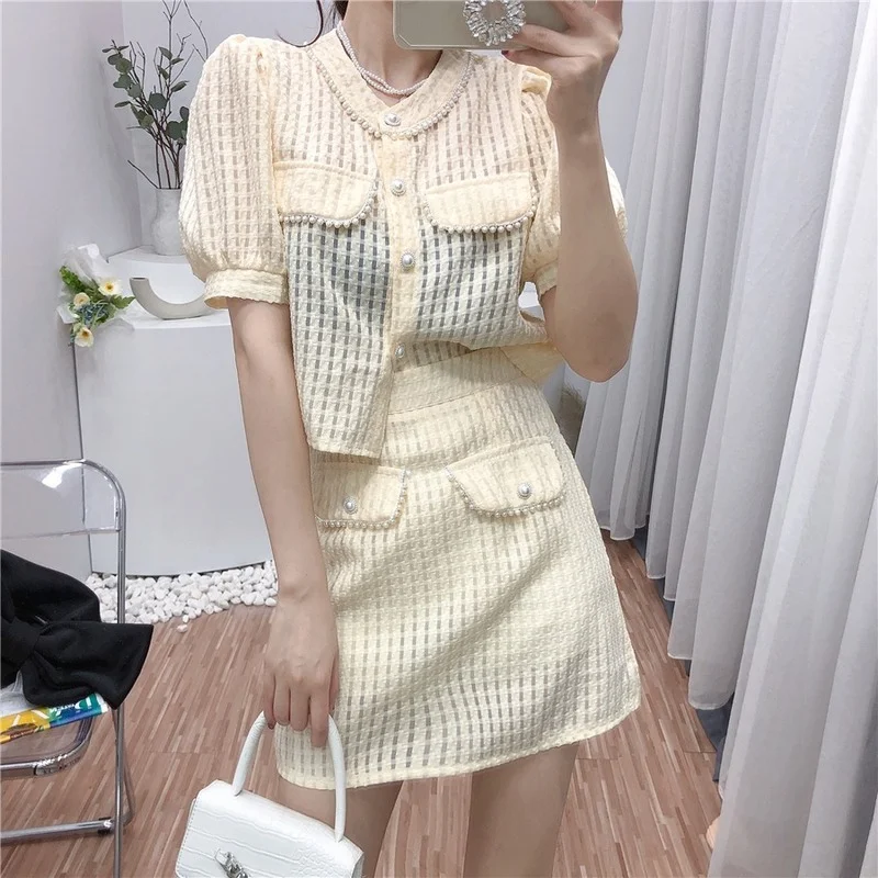 

Women 2 Piece Set 2021 Summer Korean Chic Sweet O-neck Pearl Button Shirt High Waist All-match Plaid A-line Skirt Suit