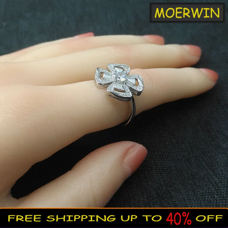 

Женское кольцо из серебра пробы, с цветком и четырьмя листьями