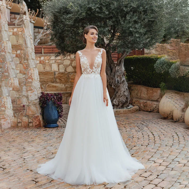 

Сексуальные белые тюлевые Свадебные платья а-силуэта с глубоким V-образным вырезом на заказ свадебные платья Gonws с открытой спиной 2022 пляжно...