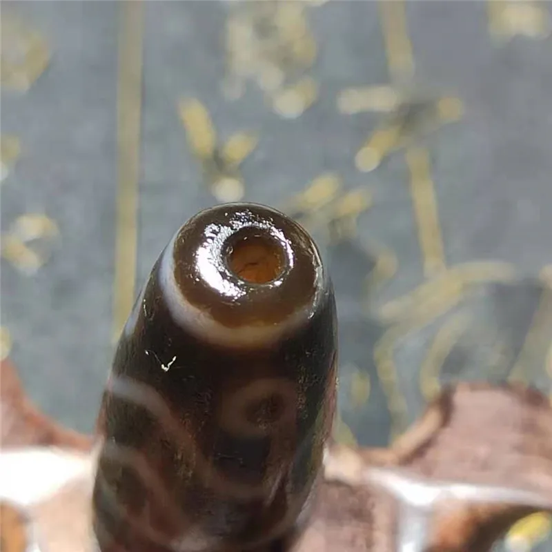 

Treasure Magic Power Tibetan Old Agate Baojiang Tiger Tooth dZi Bead 43*13mm High Quality