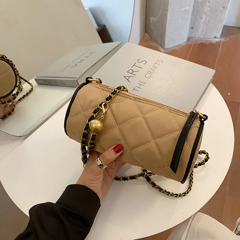 

French small design bag women's rhombic cylinder bag autumn and winter new fashion cross bag milk tea canvas underarm bag