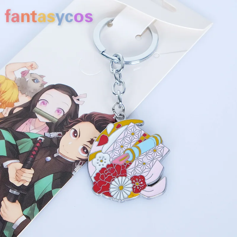 Брелок для ключей с изображением рассекающего демонов |