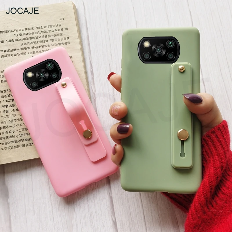 

Candy Color Wrist Strap Phone Case For Xiaomi POCO X3 NFC Wristband Shockproof Cover For POCO M3 F3 Pro Soft Holder Stand Cover