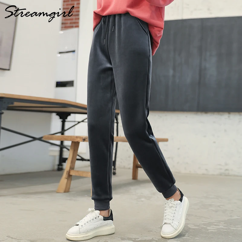 Теплые зимние брюки женские тренировочные толстые однотонные шаровары