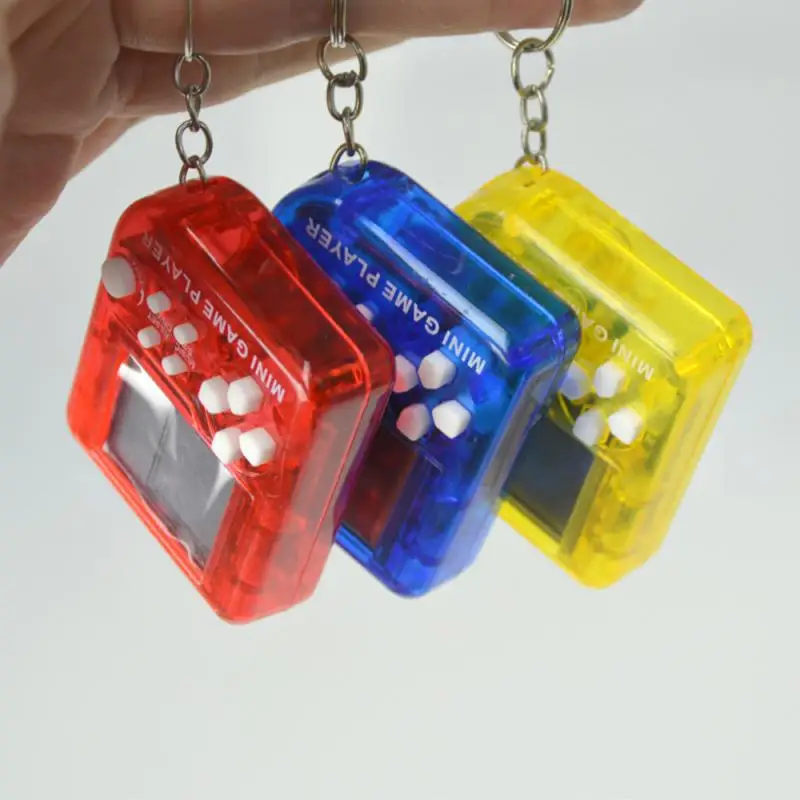 

Mini Console Game Machine Children's Handheld Nostalgic Portable Mini Tetris Game Console Keychain LCD Toy Backpack Decor