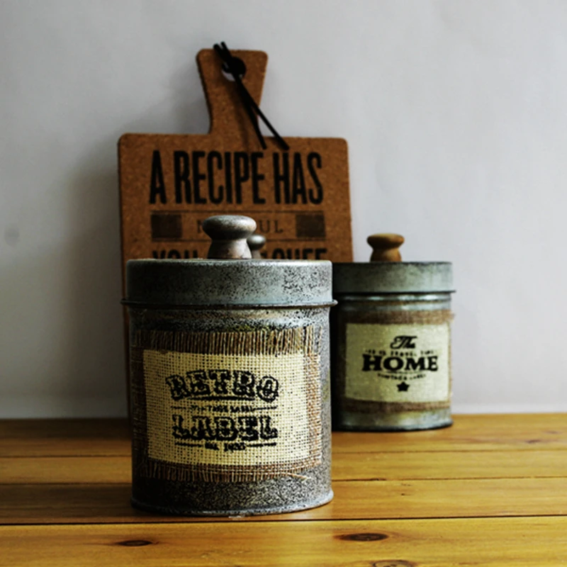 Зерна банки сохранение кованого железа с закрытыми фотографические реквизиты