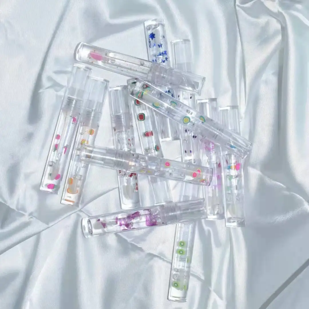

Drivworld Clear Flower Fruit Lip gloss Glitter Nude Lip Oil Vendor with Custom tubes and box
