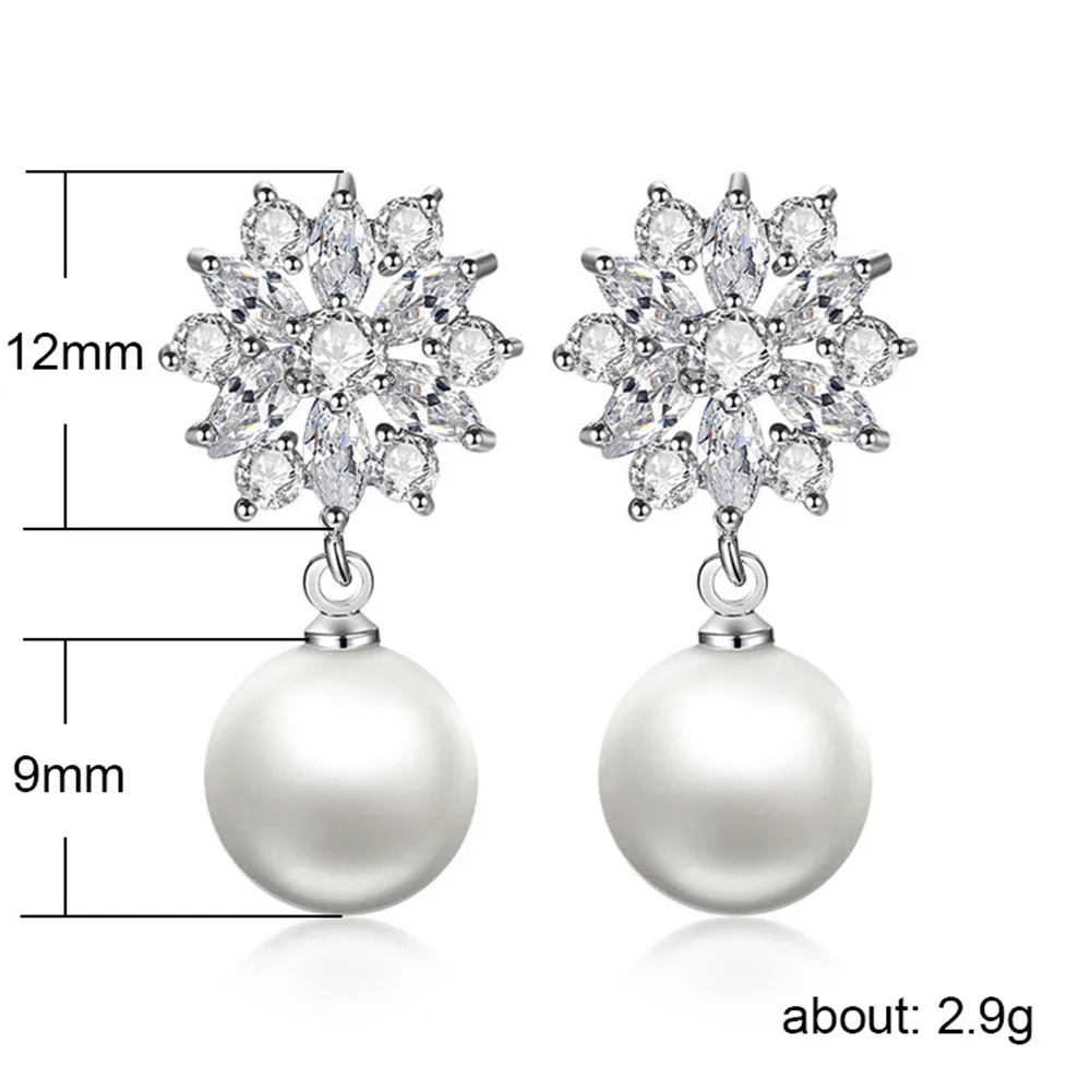 

Huitan Delicate Earrings with Clear Snowflake Design Simulated Pearl Cubic Zirconia Fashionable Wedding Drop Earrings for Women