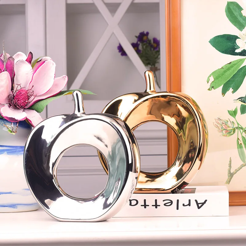 В абстрактном керамическая с гальваническим покрытием яблоко рукоделия