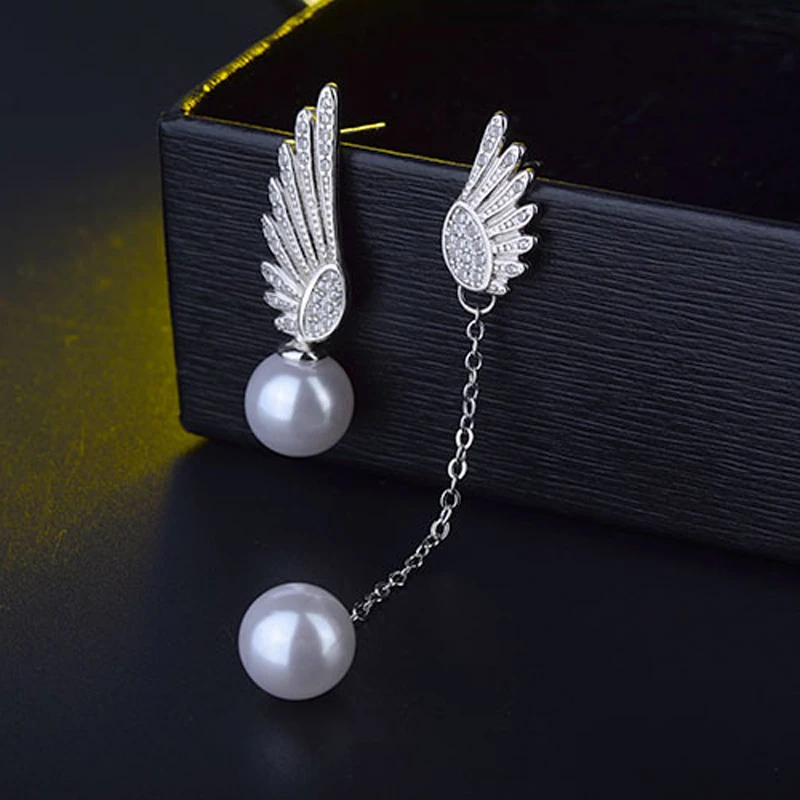 Женские серьги-гвоздики из серебра 925 пробы с двумя ангельскими крыльями |