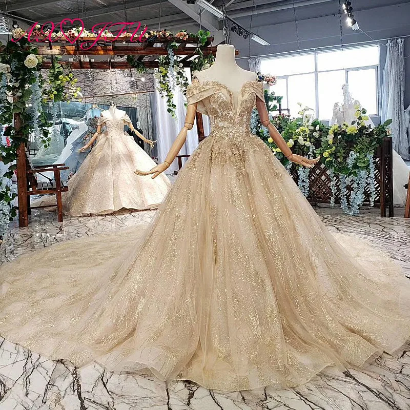 AXJFU Luxury princess golden flower lace boat neck beading crystal sparkly star bride tail wedding dress real photo 11669