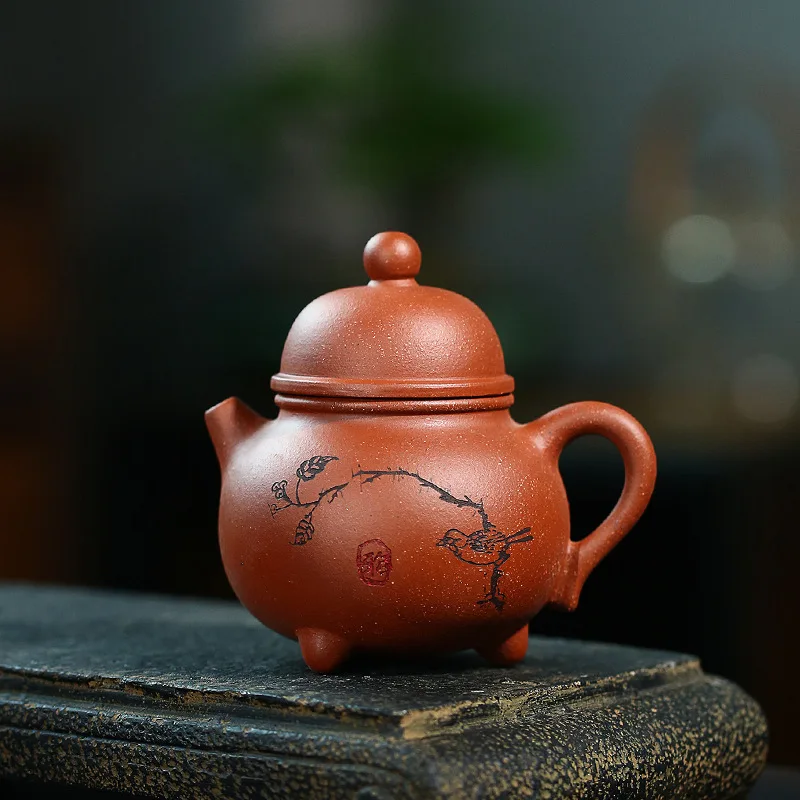 

Yixing Yixing Teapot Raw Ore Down Slope Mud Full Manual Three Foot Milk Pot Dark-red Enameled Pottery Teapot Goods Tea Set