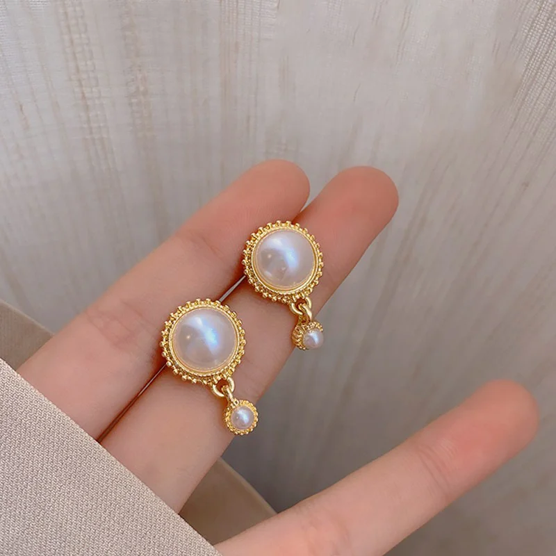 

Winter New Silver Needle Baroque Pearl Stud Earrings for Women 2021 Fashion Simple Retro Hong Kong Style Jewelry