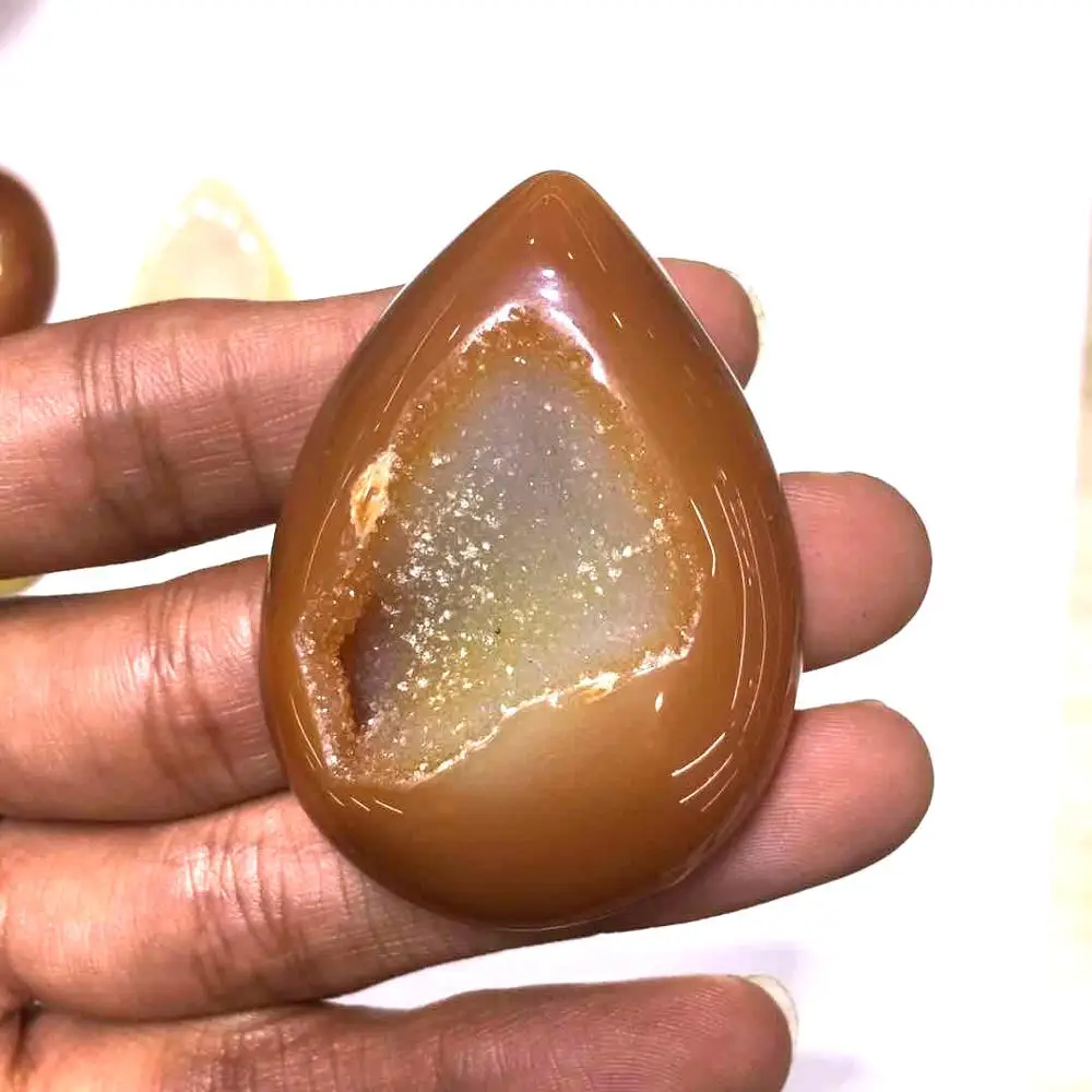 

Natural agate crystal hole chalcedony cornucopian pendant to attract money to strengthen business transport