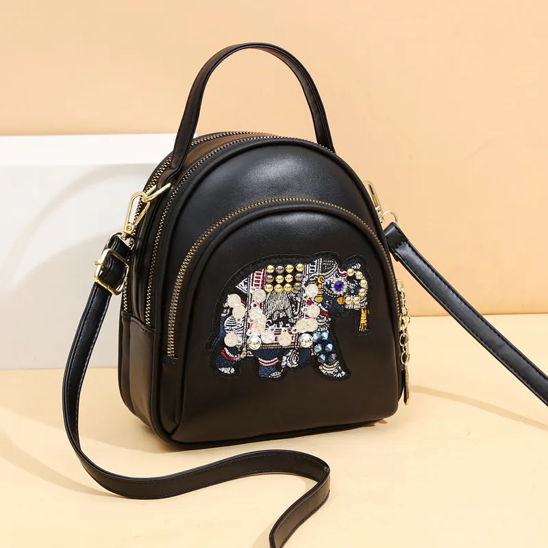 

2021 new national style slung bag for girl foreign embroidery pu leather handbag fashion simple top handle shoulder bag
