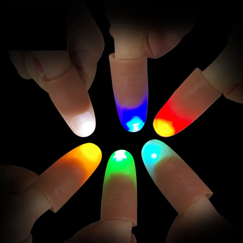 

2pcs LED Light Flashing Fingers 5*2.5cm Magic Tricks Props Funny For Stage Magia Novelty Light-Up Thumbs Toys Children Kids